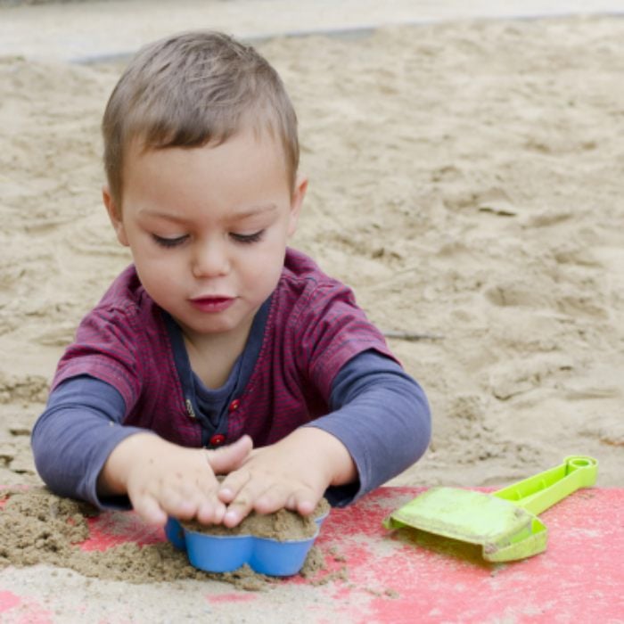 Child playing in the sandpit 