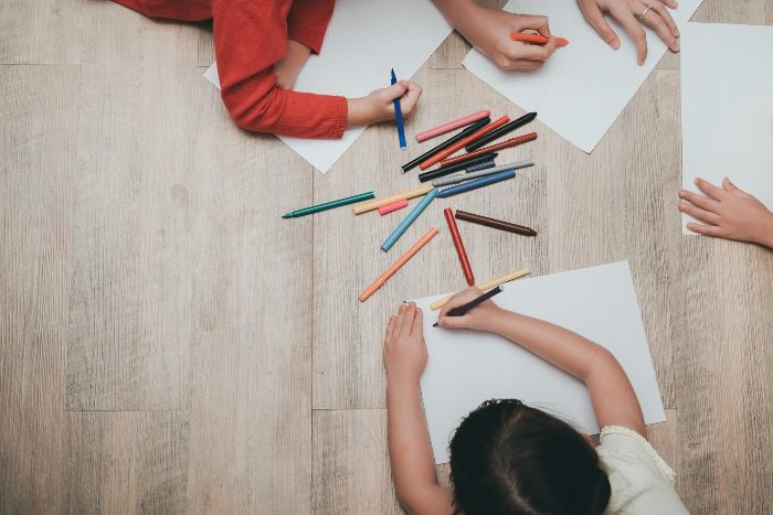 Children drawing on paper