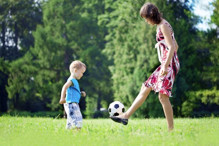 Mom and child playing with ball