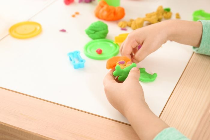 Child moulding playdough