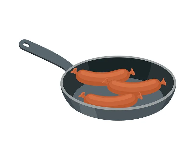 sausages frying in a pan