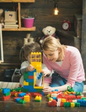 Mom and child constructing