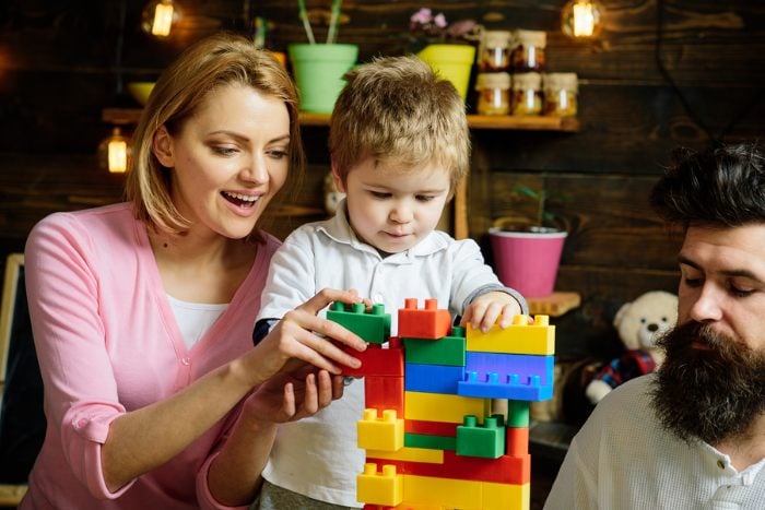 Mom and son playing with construction toys