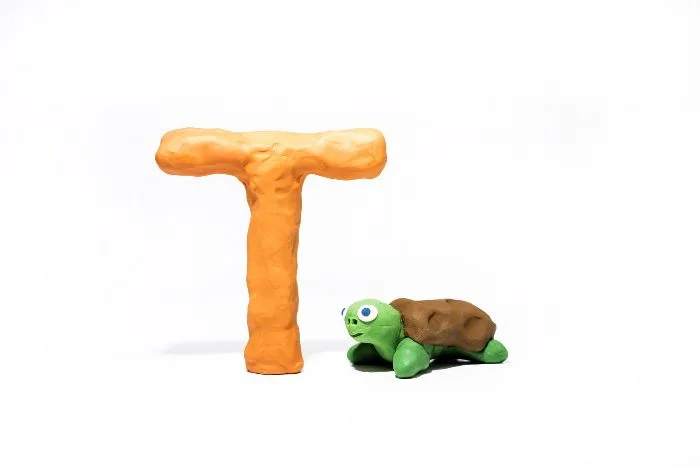 Clay letter T