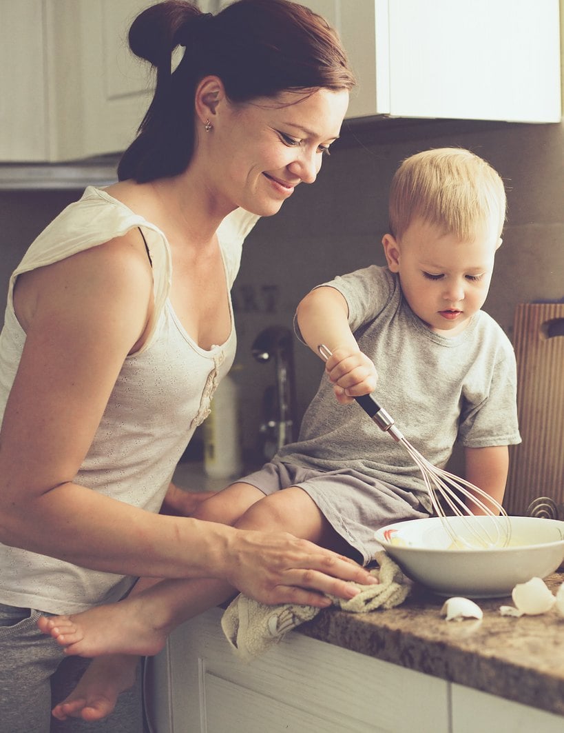 Mom and son baking