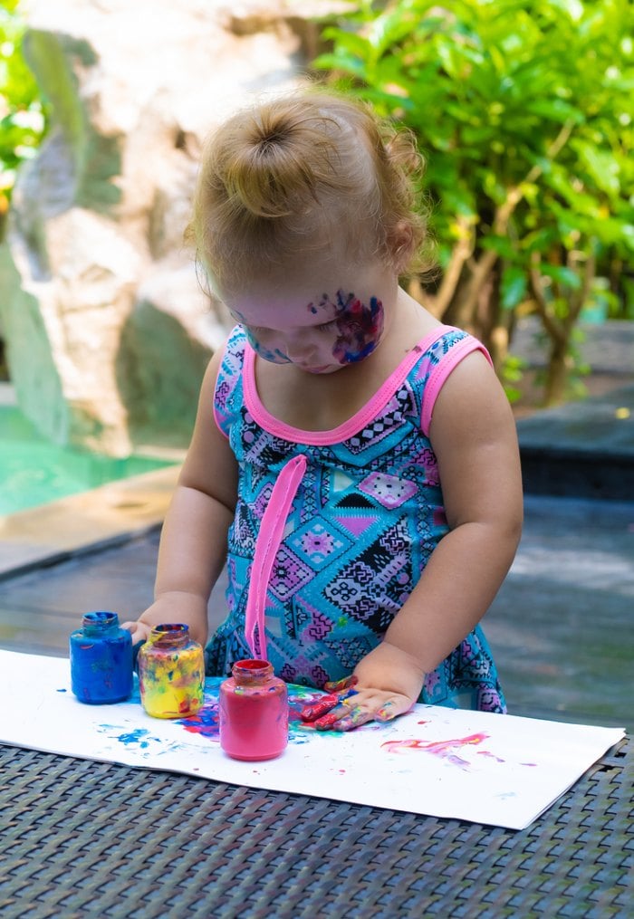 Girl finger painting