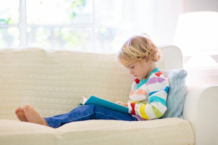 Child reading a book