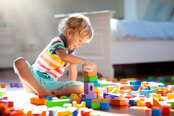 Child building with blocks 