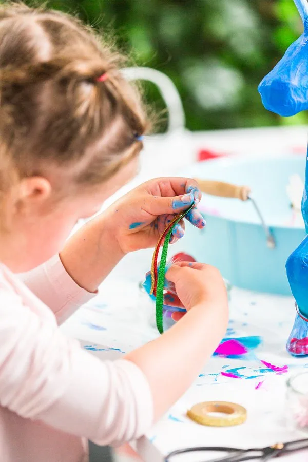 Child painting outside