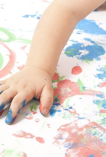 Child finger painting