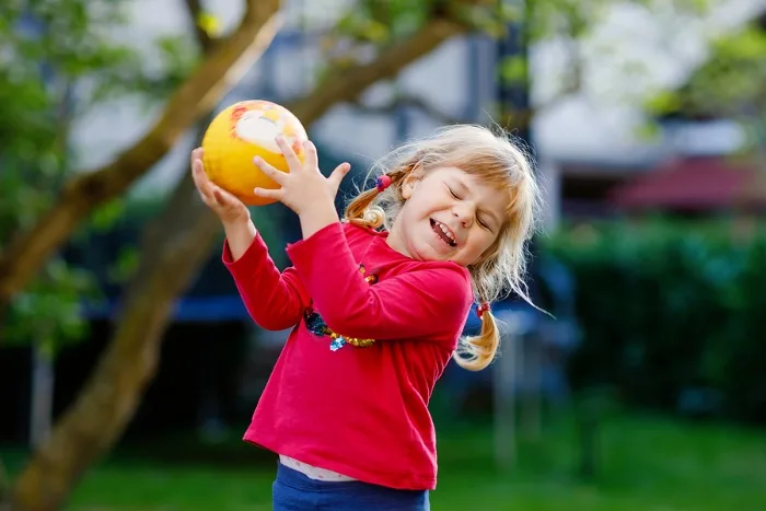 Child catching a ball 