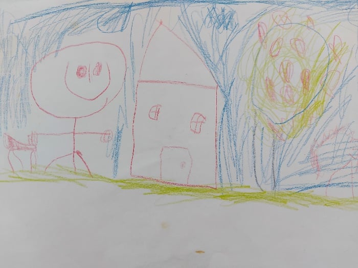 child's drawing of a house, tree, and person