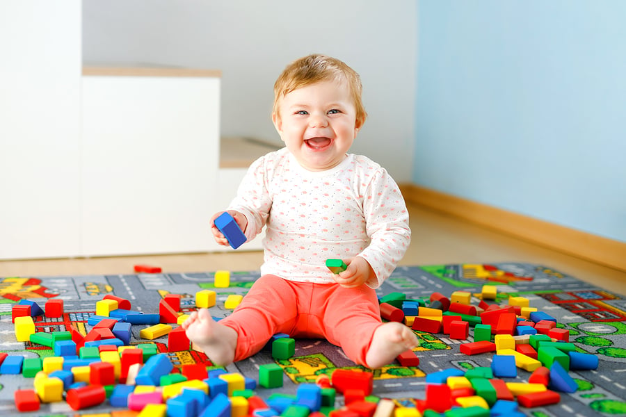 Baby playing hot sale blocks