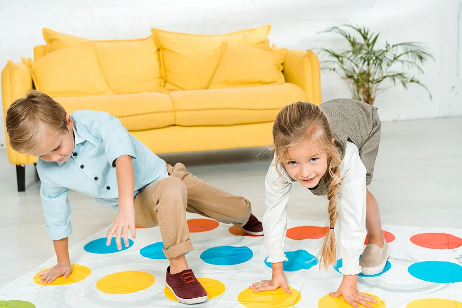 Preschoolers playing twister