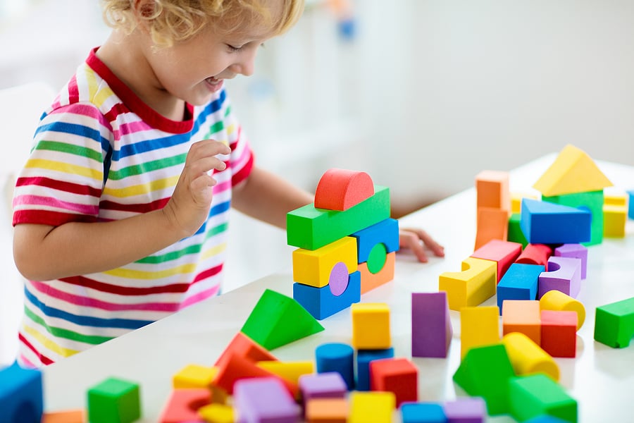 Children playing deals blocks