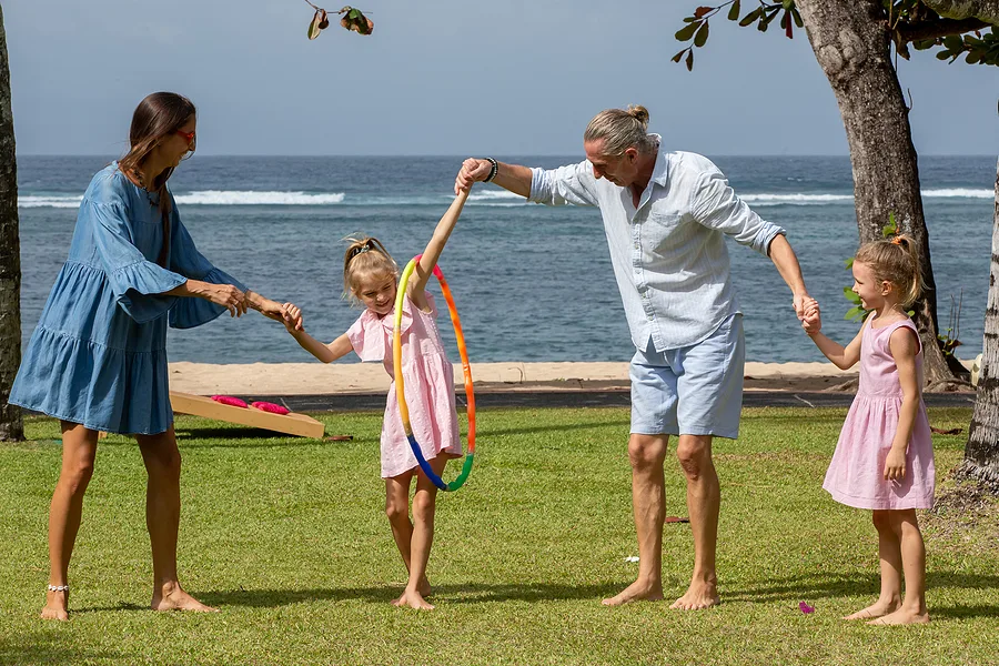 Family playing with hula hoops