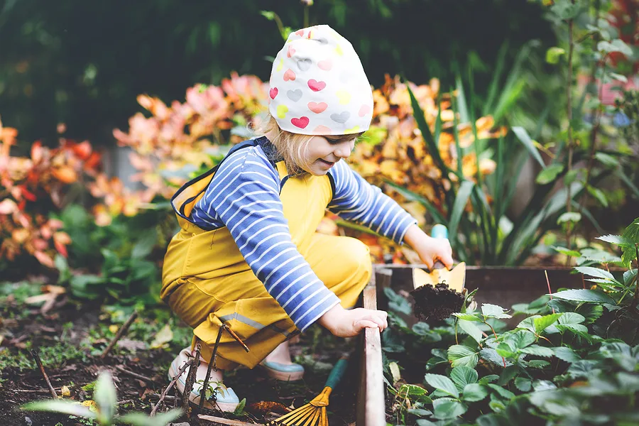 Child gardening outside