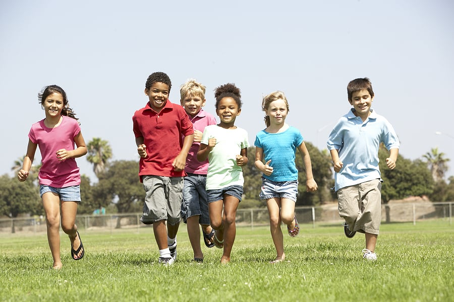 Children playing red light, green light.