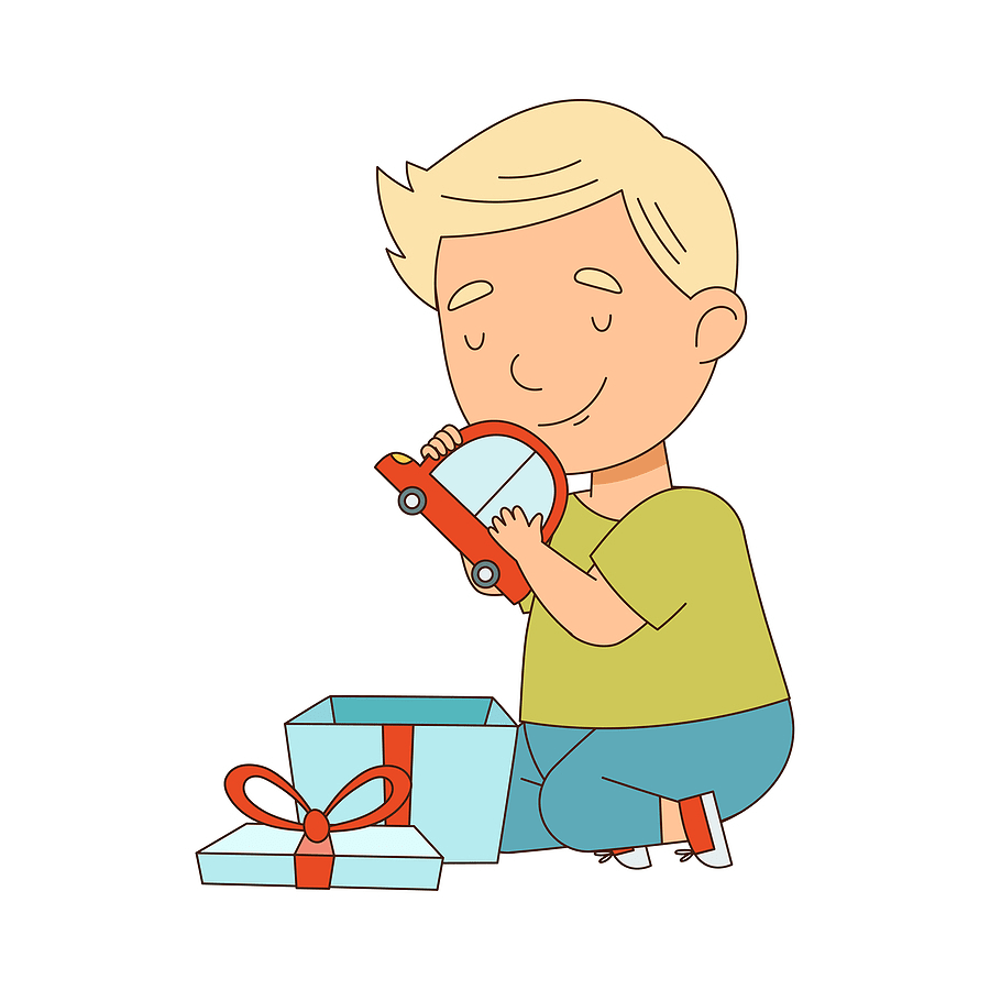 Boy finding toy car in his gift box.