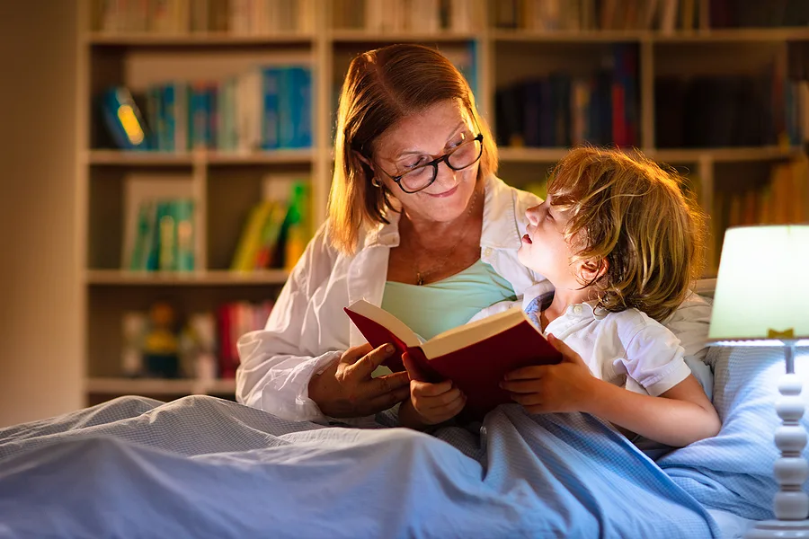 Grandmother reading to hrandson