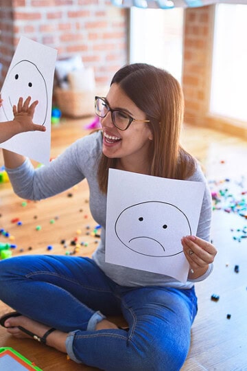 mom teaching girl emotions