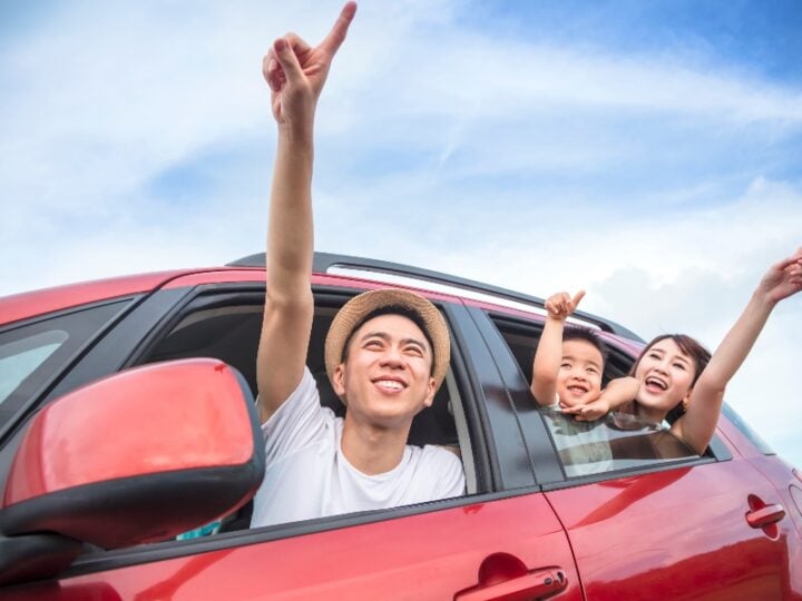 family playing rhyming game in the car