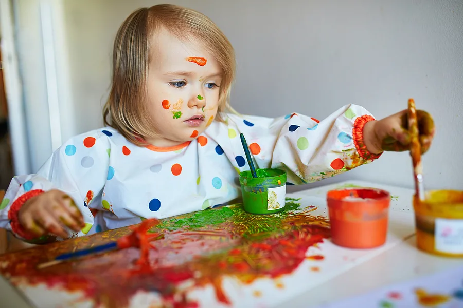 https://empoweredparents.co/wp-content/uploads/2021/11/girl-learning-about-colour.jpg.webp