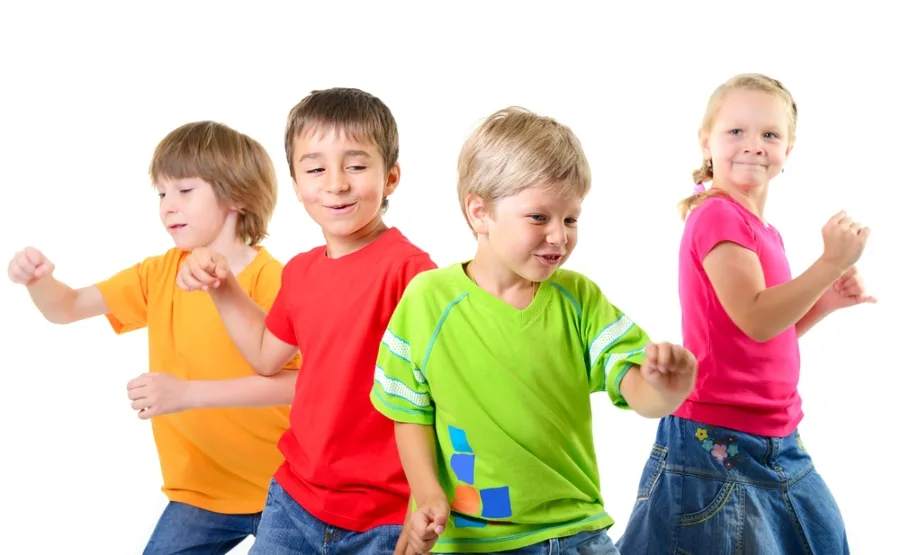 Children dancing together happily