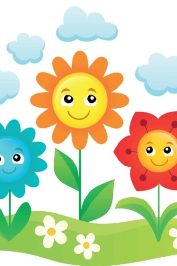 Flowers growing in the ground with ladybug flying around in the spring time