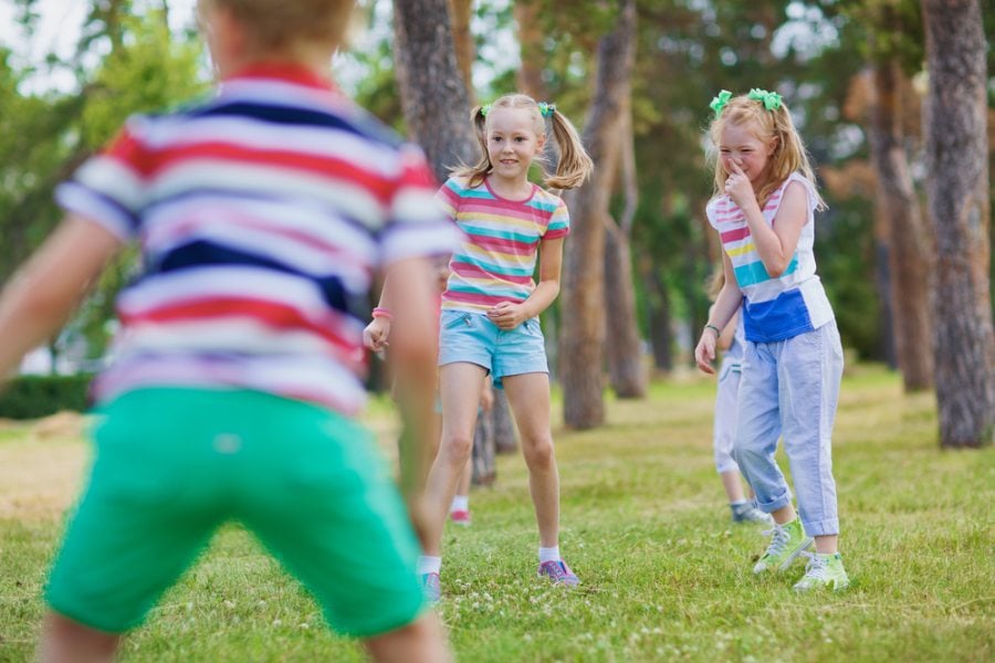 Kids playing a game of stuck in the mud