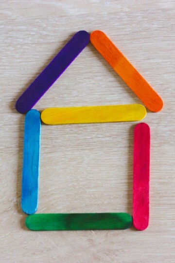 Colorful house made out of popsicle sticks