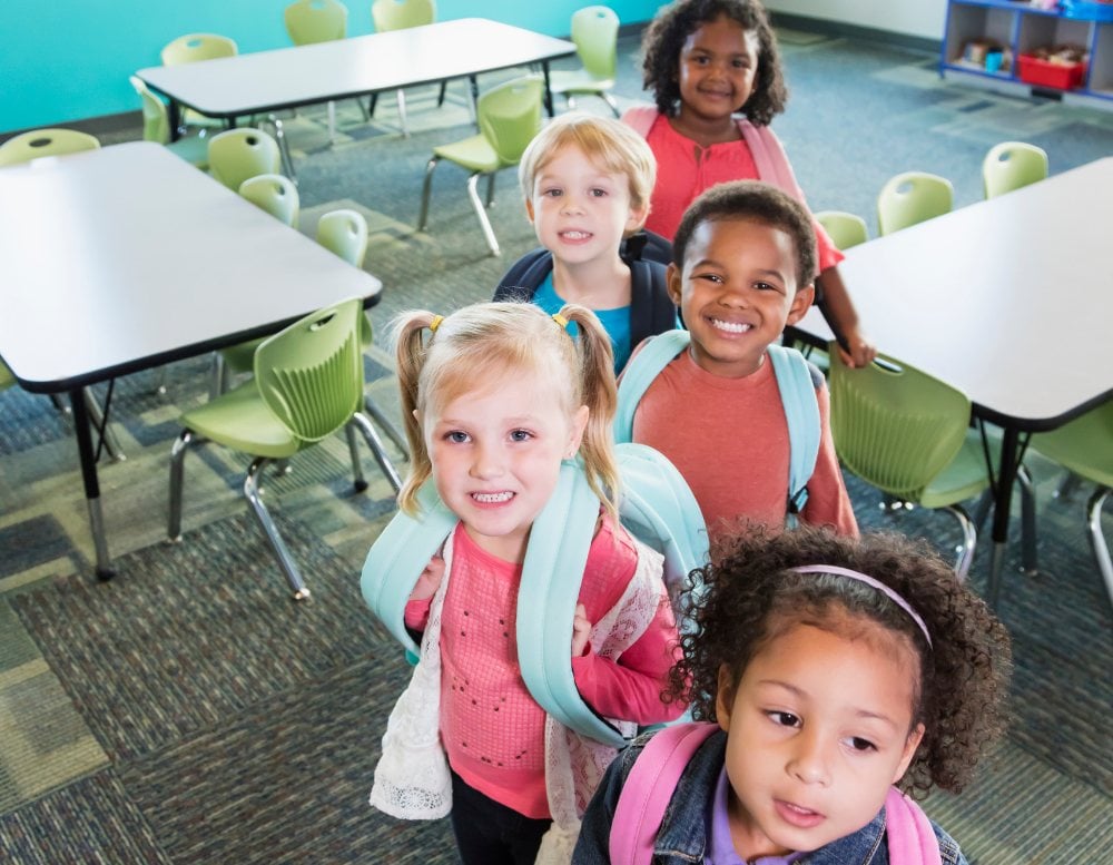 Preschool children lined up at the door