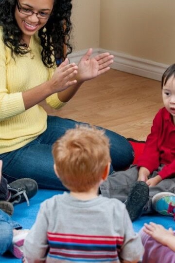 Preschool teacher leading circle time